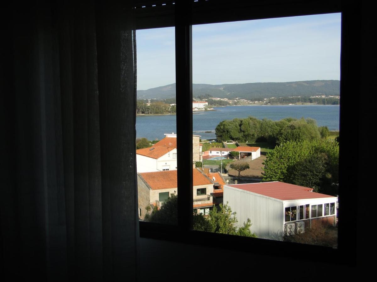 Apartamentos Blanco O Grove Esterno foto