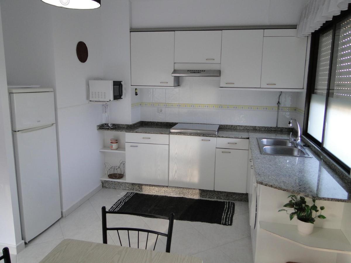 Apartamentos Blanco O Grove Esterno foto