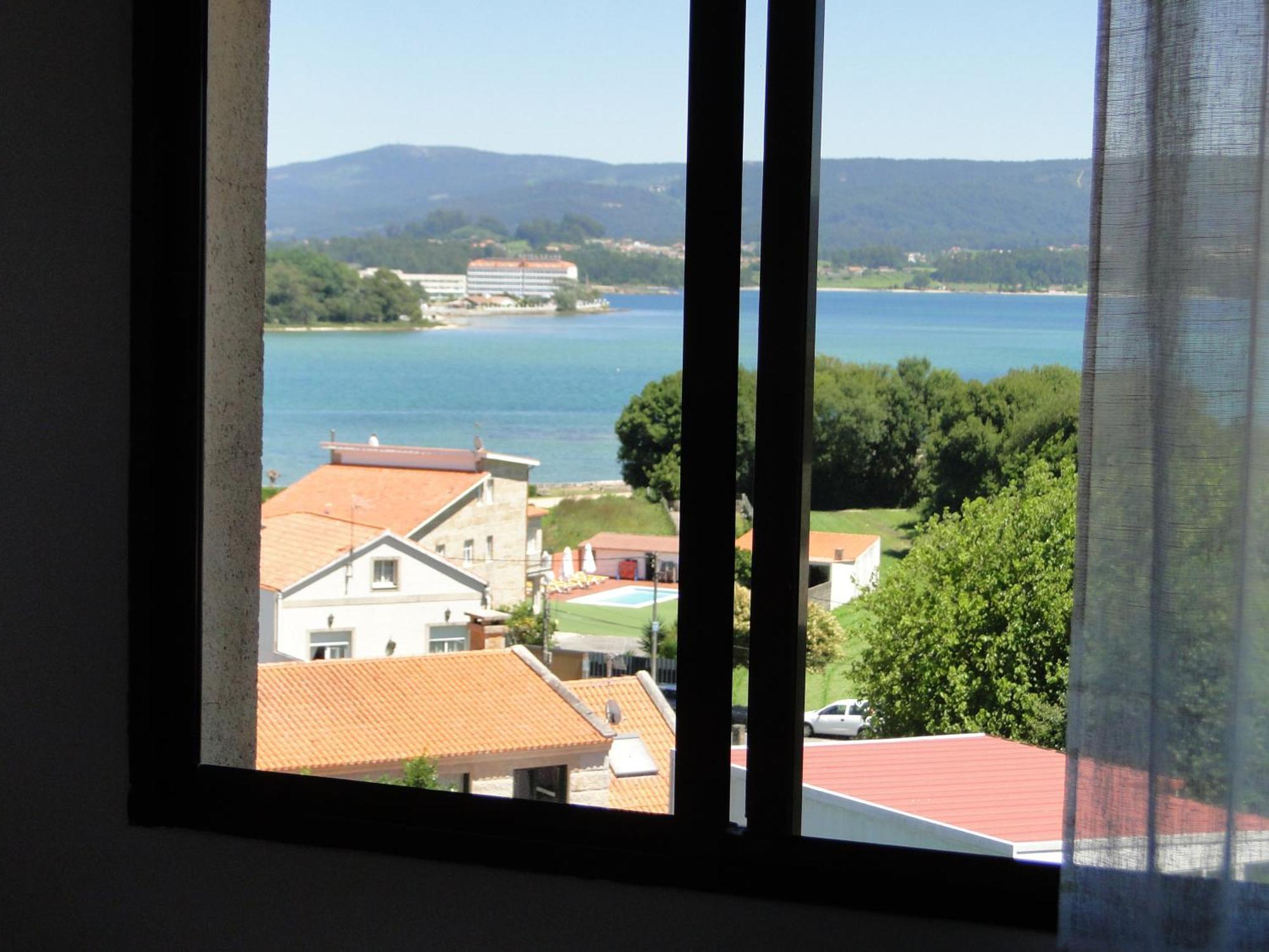 Apartamentos Blanco O Grove Esterno foto