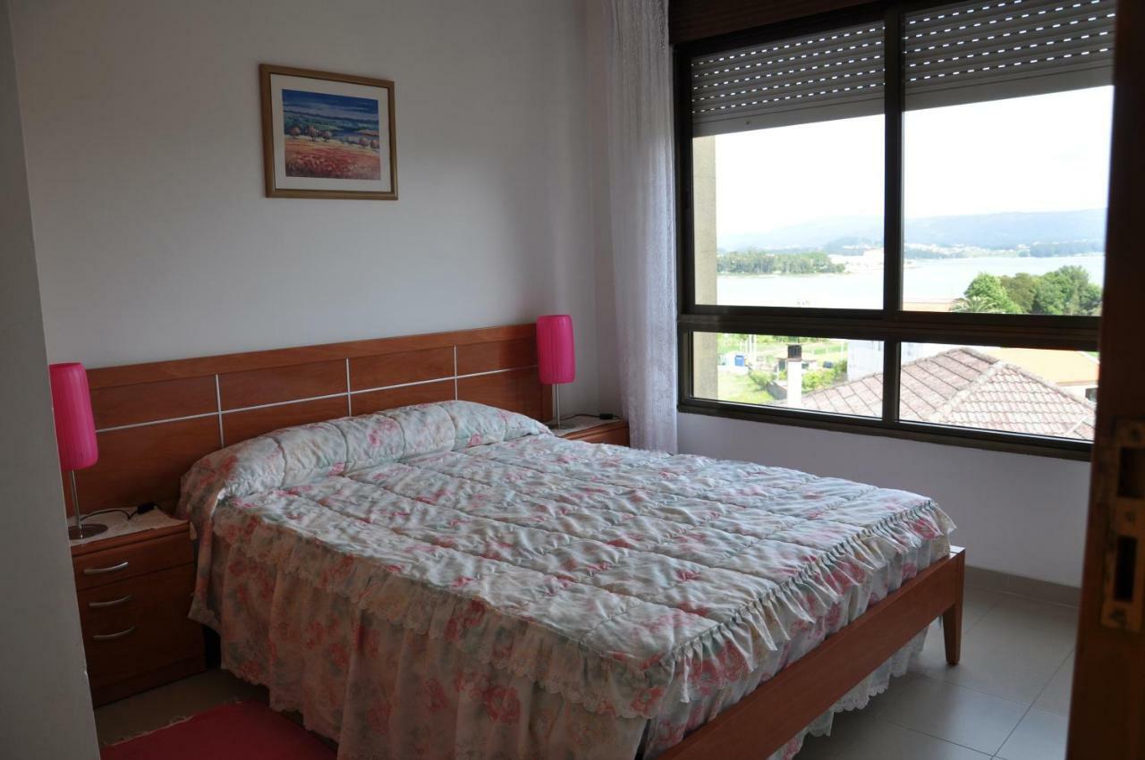 Apartamentos Blanco O Grove Esterno foto
